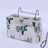Canvas bedside storage bag with wrought iron bracket for organizing items like phones and books, featuring a cactus print design from Shopway.