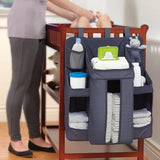 Grey oxford cloth baby crib bedside storage hanging bag with diapers, wipes, and essentials. Wall-mounted organizer for nursery use. Shopway.