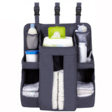 Grey oxford cloth baby crib bedside storage bag with multiple pockets for diapers, wipes, and baby essentials by Shopway.