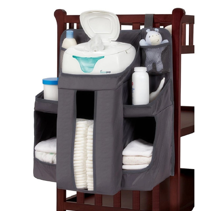 Grey oxford cloth baby crib bedside storage bag, perfect for organizing diapers, wipes, and baby essentials. Shopway.