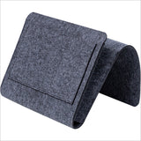 Felt bedside storage bag for dormitory, featuring multiple pockets for books and remotes. Shopway space-saving organizer in gray.