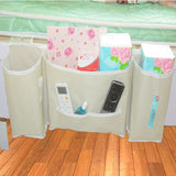 Japanese-style hanging bedside storage bag in beige, holding books, remotes, and toiletries. Ideal for bedroom or multi-use, by Shopway.