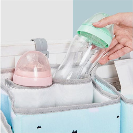 Blue and pink multifunctional diaper wet shelf bag for bedside storage with bottles, ideal for newborns, available at Shopway.