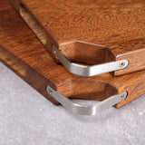 Shopway wooden chopping board, octagonal shape, features durable construction and stainless steel handles, perfect for chicken wings.