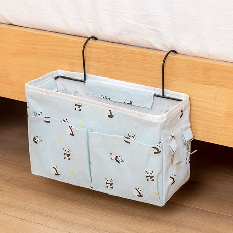 Bedside storage bag with multi-size pockets, panda print, and sturdy metal hooks. Ideal for organizing essentials. Shopway exclusive.